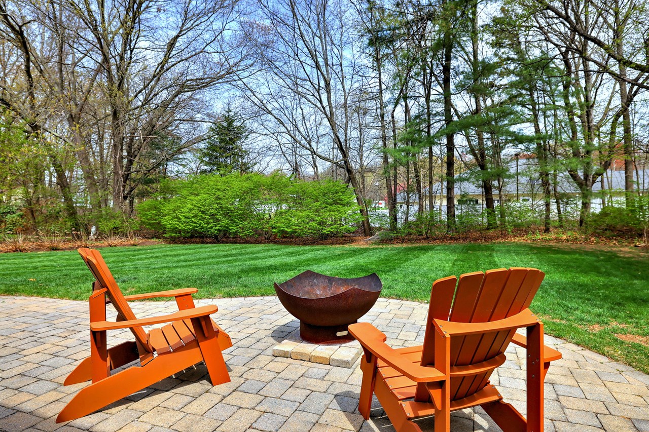 whether it's wine or hot cocoa at sunset by the fire, this backyard was made for s'mores, stories, and starry nights - just bring your own fire pit!