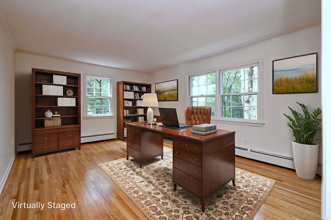 this flexible room includes a generous closet, making it ideal as a home office, guest room, or bedroom.