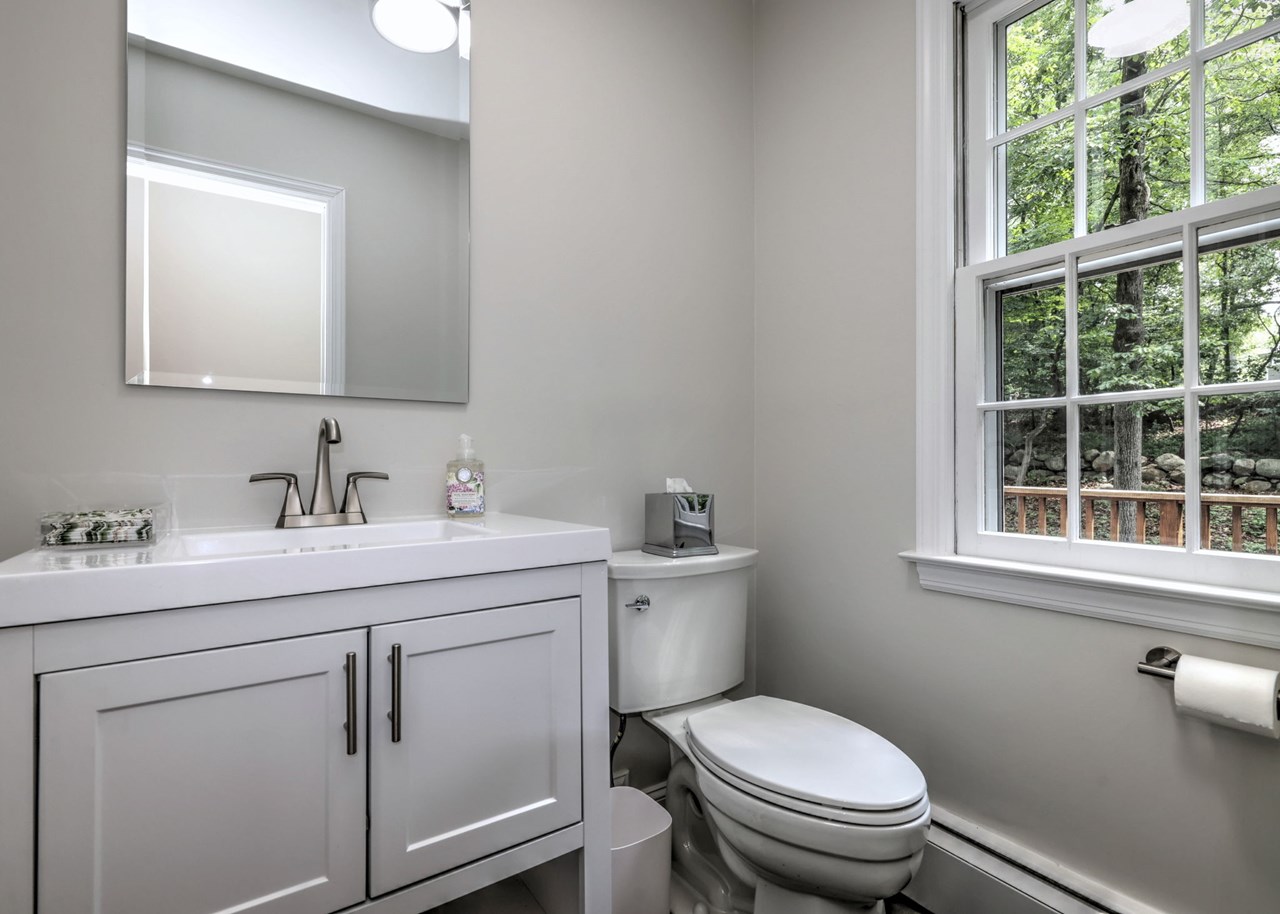 beautifully renovated powder room with modern finishes and timeless style.