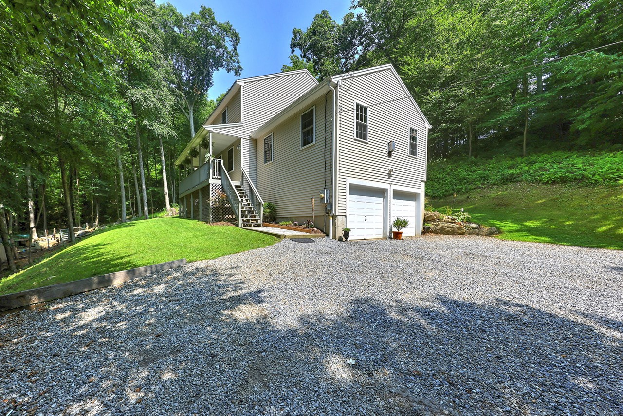 surrounded by mature trees, this peaceful setting lets you enjoy the sights and sounds of nature.